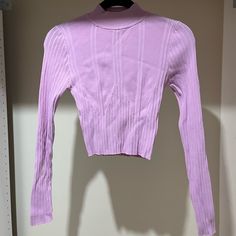 Forever 21 Cropped Long Sleeve Top, Pinky/Lilac, Size Medium. Brand New, Never Worn. Super Stretchy, Ribbed Material. Purple Stretch Long Sleeve Crop Top, Purple Long Sleeve Stretch Crop Top, Trendy Lavender Tops For Winter, Trendy Lavender Winter Tops, Trendy Cropped Purple Tops, Trendy Purple Cropped Top, Purple Stretch Top For Spring, Spring Stretch Purple Top, Fitted Lavender Tops For Fall