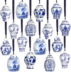 many blue and white vases are arranged together