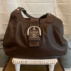 Vintage Coach Shoulder Bag -2 Compartments -Used. Great Condition. No Cracks In The Leather. Few Scuffs. No Stains In Outside. Few Spots Inside. Please Look At Photos For Any Discrepancies. A Good Leather Cleaning Will Spice This Bag Right Up! -Color: Brown -Weight: 1lb 11.4oz (Before Any Packaging) Please Ask Any Questions. All Sales Are Final. Thank You For Checking Out My Listing! Coach Brown Shoulder Bag With Leather Handles, Coach Prarie 1995, Brown Coach Bags For On-the-go, Coach Brown Bags With Silver-tone Hardware, Brown Coach Bag With Turn-lock Closure, Coach Shoulder Bag, Vintage Coach, Leather Cleaning, Nice Leather