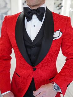 🚨 So this was one of our New Year Resolutions for 2020 and it just came true! We finally redesigned (like we did our original white paisley into the Vanilla Fiore) our Red Paisley into what we always envisioned it would be. Say hello 👋 to the all new Red & Black Fiore ❤️ 🖤#sebastiancruzcouture #redsuit #threepiecesuit #nyelook #mensfashion #bespoke #pocketsquare #menswear #newyearsready #lookoftheday #menwithclass #daytona #menssuits #trend #gentlemen #highfashionmen #suit #fashion #style #ne Luxury Red Blazer With Lapel Collar, Elegant Red Suits With Buttons, Red Semi-formal Outerwear With Button Closure, Red Blazer With Suit Collar Buttons, Luxury Red Single Breasted Blazer, Luxury Red Single-breasted Blazer, Red Luxury Single-breasted Blazer, Red Tuxedo Blazer For Winter, Red Semi-formal Blazer With Buttons