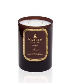 a candle that is in front of a white background with the words marlem on it