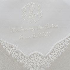 "Lovely ivory color lace wedding handkerchief personalized with classic 3-initial monogram, Mother of the Bride and your wedding date. What an exquisite wedding handkerchief for the Mother of the Bride/ Mother of the Groom or the entire wedding party! This handkerchief is also available in white, you can make your selection at checkout! Color of Handkerchief Shown: Ivory Embroidery color shown: Ivory Handkerchief Size~~Approx. 11\"x11\" Please include the following personalization information in Elegant Personalized Wedding Handkerchiefs, Classic Personalized Wedding Handkerchiefs, Elegant Customizable Wedding Handkerchiefs, Elegant Wedding Handkerchiefs Customizable, Elegant Machine Embroidered Handkerchiefs For Gifts, Elegant White Handkerchiefs For Wedding Gift, Elegant Monogram Handkerchiefs For Wedding, Elegant Monogrammed Handkerchiefs For Weddings, White Wedding Handkerchiefs With Custom Embroidery