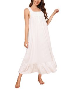 PRICES MAY VARY. 【Ladies' Comfotable Nightgown】 This sleeveless nightgown for women is made of soft, comfortable, lightweight, skin friendly and not see through fabric keep you comfortable without feeling flimsy or tight allowing for you comfort to lounge around house. 【Sleeveless Long Sleep Gown】Rubehoow Retro Long Sleep Gown is feature with beautifully cotton embroidery around the saquare neck, vintage flroal print, button-front placket with clear crystal buttons, Sleevelesss , 2 side pockets, and flattering flowy ruffle along the hemline, add to the romance of this cotton knit nightgown. 【Vinatge Sleeveless Nightgown】This ankle jength pajama dress allows your body to stay warm without suffocating you. The elegant sway of the nightgown while you walk provides loose zone to your legs when Wedding Night Camisole Sleepwear, Cotton Nightgown With Spaghetti Straps For Sleep, Cotton Summer Nightgown, Cotton Camisole Nightgown For Bedtime, Cotton Camisole Nightgown For Sleep, White Sleeveless Dress For Sleepover, Summer Home Dresses With Spaghetti Straps, Spring Wedding Night Sleeveless Nightgown, Summer Camisole Nightgown For Home