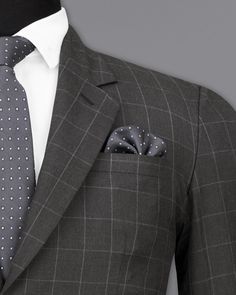 This Single Breasted Suit is a stylish and unique addition to any formal wardrobe. Made from high-quality materials, this suit features a striking windowpane checkered pattern that is perfect for making a statement. The single-breasted design adds a touch of sophistication, while the comfortable regular fit ensures all-day comfort. Ideal for formal occasions and weddings this suit is sure to impress everyone around you. In addition to being constructed from Imported Superior Fabrics, French crow Professional Office Sets In Suiting Fabric, Professional Single Breasted Suiting Fabric Sets, Professional Single-breasted Suiting Fabric Set, Business Casual Single Breasted Suit Sets, Single Breasted Business Casual Suiting Sets, Business Casual Single-breasted Suit Set, Single Breasted Suiting Fabric Sets For Business Casual, Tailored Plaid Three-piece Suit For Formal Occasions, Elegant Houndstooth Blazer For Business Casual