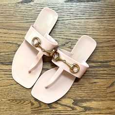 These Sandals Are Simple But Classy With Gold Buckle Detail On Top. These Are From Anthropologie And Have Never Been Worn - Excellent Condition. Chic Pink Flip Flops For Summer, Pink Flat Jelly Sandals For Vacation, Chic Pink Flat Jelly Sandals, Chic Pink Beach Flip Flops, Chic Pink Jelly Sandals With Round Toe, Chic Pink Flip Flops For Beach, Chic Pink Open Toe Jelly Sandals, Feminine Pink Flat Sandals, Chic Pink Jelly Sandals For Vacation