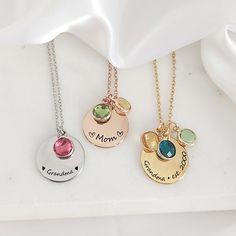 "Round necklace with your kids birthstones, the dainty coin can be engraved with names and symbols,  a great gift for mom, new moms, sister and grandma, you can purchase the necklace with up to 10 birthstones of your choice. The necklace is engraved on the front only, if you want a message engraved on the back you can purchase the extra side engraving following this link, please select the option TEXT: https://www.etsy.com/ca/listing/1516288937/add-on-personalization-engraving?click_key=ddc4ed739d39c0ce77e302cba362f062a9e68b2e%3A1516288937&click_sum=6c692b9f&ga_search_query=add%2Bon&ref=shop_items_search_3&frs=1&crt=1 We engrave each item in our studio, using a laser engraving process that creates a very precise and detailed image, the machine creates a darker tone image with no ink, this Grandma Necklace Birthstone, Birthstone Jewelry Mothers, Grandma Jewelry, Mom Necklace Personalized, Grandmas Jewelry, Grandma Necklace, Personalized Grandma Gifts, Mama Necklace, Zodiac Sign Necklace