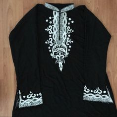 Elegant Black/White Long Sleeve Dress/Abaya Beautifully Made Embroidery From Neck To Top Part Brand New Never Worn Matching Embroidery Scarf. (66”X 23”) Zipper From The Chest To Neck To Adjust Embroidery On Wrist Size 56 Length: 54” Bust: 22” Sleeve: 21” Neck: 14” Nwot Black Thobe With Floral Embroidery And Long Sleeves, Black Long Sleeve Thobe With Floral Embroidery, White Long Sleeve Abaya With Floral Embroidery, Elegant Abaya With Chikankari Embroidery For Eid, Traditional Black Thobe With Floral Embroidery, Elegant Black Kaftan With Chikankari Embroidery, Elegant Long Sleeve Thobe With Floral Embroidery, Elegant White Tunic Kurta, Elegant White Kurta