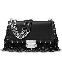 Charming Eyelet Accents Enhance The Appeal Of The Take-Anywhere Michael Michael Kors Sloan Chain Shoulder Bag. 8-1/4"W X 5-1/2"H X 2-3/4"D (Width Is Measured Across The Bottom Of Handbag) Silhouette Is Based Off 5'9" Model 11"L To 20"L Strap Push-Lock Closure Silver-Tone Exterior Hardware 1 Interior Zip Pocket, 1 Slip Pocket & 1 Center Zip Compartment Suede; Lining: Polyester Luxury Silver Shoulder Bag With Chain, Elegant Silver Bag With Silver Chain, Chic Silver Bag With Silver Chain, Chic Evening Bag With Silver Chain, Designer Evening Bags With Silver Accents, Silver Evening Bag With Silver Chain, Silver Leather Bag With Chain Strap, Rectangular Evening Shoulder Bag With Silver Accents, Luxury Black Bags With Silver Accents