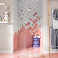 a bathroom with pink and white tiles on the walls, shower stall and rugs