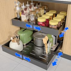 an open cabinet with spices and other kitchen items in the bottom drawer, labeled arrows pointing to them