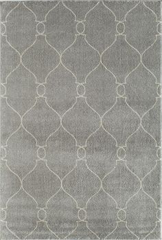 a gray rug with white circles on it