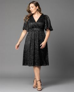 Sparkle at your next soiree in our Starry Sequined Lace Cocktail Dress. This party dress features a flattering surplice neckline, flirty flutter sleeves and a graceful A-line silhouette. This sparkly little outfit even has a surprise element - pockets! Perfect for that best dressed curvy wedding guest or any special occasion from holiday party to formal gala. This elegant plus-size sequin dress is offered in classic black, navy blue, gold champagne as well as a seasonal blue-green teal color. Ma Jumpsuit And Cardigan, Curvy Wedding, Plus Size Sequin, Chic Cardigan, Lace Cocktail Dress, Evening Gown Dresses, Gold Champagne, Sequin Cocktail Dress, Surplice Neckline