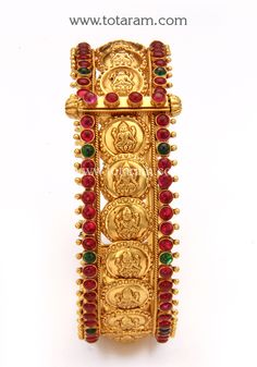 22 Karat Gold "Lakshmi Kasu" Kada With Beads (Temple Jewellery) - Single Piece
  Note : This item comes with a Screw and hinge so that you can open it up for easy wearing. - 235-GK648 - in 38.550 Grams for USD $2955.74. 
Made in India by Totaram Jewelers Online this product is in Gold - 22 Karat BIS Hallmark 916 KDM Gold  & is an excellent gift for Adult - Women. Ships fully insured with secured guaranteed delivery for free with your order over $250 from New Jersey USA & comes with 30 da Temple Jewellery, Gifts For Adults, 22k Gold, Can Opener, Single Piece, New Jersey, Hallmark, Screw, Temple