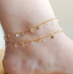 Super cute Pearl Anklet that you will seriously loveee. Effortless, yet adds lots of sparkles and perfect for foot everyday. Makes the PERFECT gift for self or someone awesome. THE PERFECT GIFT 14KT GOLD PLATED Stainless steel GEMSTONE Zircon stone - Each order would be individually gift-wrapped :) - Meticulously handcrafted especially for you! Gold Dangle Anklets As Gift, Gold Dangle Anklets For Gift, Gold Adjustable Dangle Anklets, Gold Dangle Anklets With Adjustable Fit, Trendy Gold Anklet With Adjustable Chain, Elegant Gold Dangle Anklets, Adjustable Dangle Anklets With Chain, Handmade Gold Toe Ring Anklets, Handmade Trendy Gold Anklets