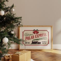 a polar express sign next to a christmas tree