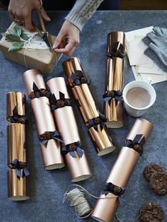 several wrapped presents sitting on top of a table