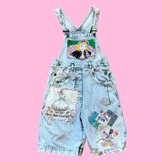 Let's Kitch-ify some overalls ! 100% Upcycled and eco friendly vintage overalls  given new life with the addition of vintage embroidery, hankies, and textiles ✨ To give it that crazy quilt feel, I've hand embroidered stitches to the pieces, a absolute labor of love ❤️ Measurements: Bust: free. Waist: 28 in. Hip: 36 in. Inseam: 9 in. Length: 22 in. Total rise: 28 in. All items are made of true vintage materials and maay show signs of the age. Please look at pictures closely. Vintage Cotton Shortalls For Spring, Spring Embroidered Cotton Overalls, Vintage Spring Shortalls Overalls, Vintage Spring Shortalls Overall, Vintage Overall Shortalls For Spring, Vintage Bib Front Shortalls For Spring, Vintage Denim Overalls With Patchwork, Vintage Cotton Patchwork Overalls, Vintage Spring Overalls With Bib Front