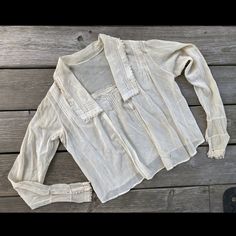 - Antique white blouse with lace trim - Label reads "Fantana Hand Made" - Fabric is very delicate, with wear as shown - Measures 18 inches across the chest, 19 inches from shoulder to hem (shorter in the back) - Offers accepted on this item! All items can be returned for a full refund if you are not satisfied for any reason. I pay shipping both ways.