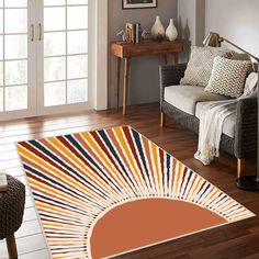 a living room with sunburst rugs on the floor