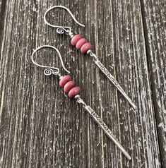 Gorgeous handcrafted Karen Tribe Silver beaded Earrings. Stunning rose pink rhodonite beads with an amazing Karen Hill Tribe silver printed spike charm. AAA rose pink rhodonite rondelle beads measure 6mm. These earrings measure 3 inches are a light weight. Hill Tribe silver has a silver content of 97%-99%. All Hill Tribe silver is directly imported from Thailand. Earrings comes in a gender neutral jewelry gift box. Custom orders are my specialty. I am happy to substitute any gemstone or silver b Handmade Pink Spiritual Earrings, Handmade Spiritual Pink Earrings, Spiritual Nickel-free Pink Jewelry, Pink Sterling Silver Beaded Earrings, Adjustable Pink Sterling Silver Beaded Earrings, Pink Artisan Earrings With Dangling Beads, Artisan Pink Earrings With Dangling Beads, Sterling Silver Pink Dangling Bead Earrings, Bohemian Pink Sterling Silver Earrings