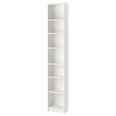 a tall white bookcase with four shelves