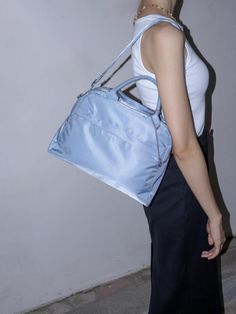 Composition : 100% nylonColor : Glow BlueCountry of Origin : Republic of Korea Blue Nylon Shoulder Bag With Detachable Strap, Blue Nylon Shoulder Bag, Blue Nylon Bags For Spring, Blue Nylon Shoulder Bag With Zipper, Blue Nylon Shoulder Bag For Travel, Light Blue Nylon Bag For Daily Use, Light Blue Shoulder Bag For Travel, Trendy Blue Nylon Shoulder Bag, Blue Nylon Shoulder Bag For Everyday Use