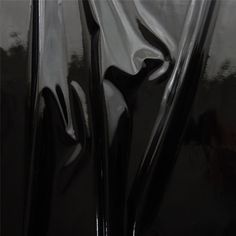 an abstract photograph of black and white paint