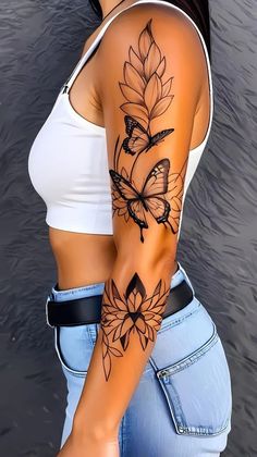 a woman with a butterfly tattoo on her arm