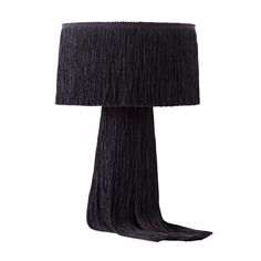 a black lamp with fringes on it