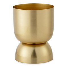 a gold cup sitting on top of a metal stand