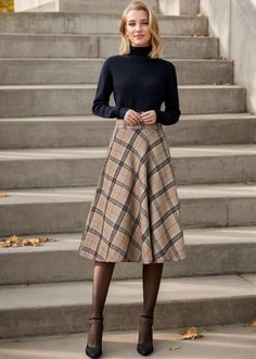 The skirt is very warm and cozy in wool, with a mid-length that hits just at mid-calf and an A-line fit as well as just the right amount of plaid. ★★ FEATURES * 30% wool, 30% fiber, 40% polyester * Polyester lining * Two side seam pockets * Right zipper closure * back little elastic band * Plus size full skirt * A Line Skirt * Perfect for Winter, autumn * Dry clean ★★ The model is 170 cm (5′ 7″) tall with a 80 cm (31.5") bust, 66 cm (26") waist. She is wearing the plaid wool skirt in size XS. ★★ Bespoke Order Service If you Request other color Request the length Your height is not between 155 cm- 172 cm Your weight is over 75 kg I can do it for you, It will need some extra fee depending on on your need. Contact with me for more detail. ★★ Get your size in Size Chart with your body measurem Cool Winter Fall Outfits, Wool Skirt Outfit Fall, Library Chic Fashion, Professional Christmas Outfits, Vintage Wool Skirt Outfit, Women Fall Casual Outfits, Vintage A Line Skirt, 1950 Fall Fashion, Plaid Skirt Outfit Work