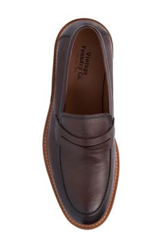 A classic penny keeper distinguishes this leather loafer for a timeless well-dressed staple. Lace-up style Cushioned insole Leather upper/leather and textile lining/rubber soe Imported Business Casual Goodyear Welted Moccasins, Business Moccasins With Leather Footbed And Moc Toe, Masculine Wingtip Moccasins With Leather Sole, Office Leather Moc Toe Shoes, Masculine Plain Toe Moccasins For Semi-formal Occasions, Masculine Goodyear Welted Moccasins With Round Toe, Business Casual Goodyear Welted Moccasins With Moc Toe, Masculine Loafers With Leather Footbed And Moc Toe, Masculine Loafers With Leather Footbed And Round Toe