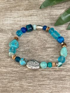 Aqua beachy mix of semi precious stones , glass , wood and shell beads. Coastal vibe🌴☀️😎 Blue Spiritual Stretch Bracelet For Beach, Spiritual Blue Stretch Bracelet For Beach, Casual Beach Beaded Bracelets With Natural Stones, Casual Beaded Bracelets With Natural Stones For Beach, Spiritual Turquoise Stretch Bracelet For Beach, Casual Turquoise Stretch Bracelet With Natural Stones, Bohemian Stretch Bracelet With Gemstone Beads For Beach, Beach Stretch Bracelet With Gemstone Beads, Beach Stretch Bracelet With Round Gemstone Beads