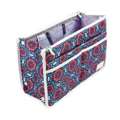 a blue and red flowered bag with two compartments on the front, one is open