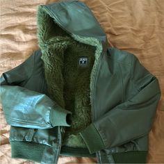 Olive Green Frye Bomber Jacket, Faux Fur Lining And Faux Leather Material, Waistband At Bottom And Faux Fur Hood, Small/ Medium Size Fur Hood, Bomber Jackets, Leather Material, Medium Size, Olive Green, Faux Fur, Bomber Jacket, Faux Leather, Jackets & Coats