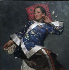 a painting of a woman laying on a pillow with her hand to her ear and holding a purse