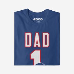 He’s not just your dad, he’s the best one around! A dad as amazing as yours deserves a shirt that shows off his favorite team. Make sure everyone knows how great of a dad and fan he is with this Buffalo Bills #1 Dad T-Shirt. This top features a design that showcases your all-important team colors and a bold team logo display across the chest, meaning this t-shirt will prove your unmatched dedication to the Buffalo Bills when you’re at the game or watching at home with your #1 family. In other wo Game Day T-shirt With Team Name For Father's Day, Team Name T-shirt For Game Day On Father's Day, Game Day Team Spirit T-shirt For Father's Day, Team Name T-shirt For Game Day, Father's Day Team Spirit T-shirt With Crew Neck, Father's Day Team Spirit Crew Neck T-shirt, Father's Day Fan Apparel T-shirt With Team Name, Father's Day Team Spirit Tops With Team Name, Father's Day Team Spirit Graphic T-shirt