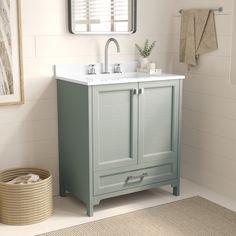 a bathroom with a sink, mirror and rug