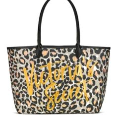 This Was Sold Out Online - Hard To Find Victoria's Secret Tote Bag Brand New With Tags A Tan/Gray With Black And Pink Leopard Print. Gold Metallic Letting Across The Front Says "Victoria's Secret". Shimmery Detail On The Animal Print Throughout The Bag. The Interior Is A Large Open Area With One Side Slip Pocket That Says "Love, Victoria". Open Top, No Closure. Durable Canvas. Big Enough For Overnight But Small Enough For Daytime Use! Large Capacity Leopard Print Bag For Shopping, Everyday Beige Victoria's Secret Bag, Trendy Beige Victoria's Secret Bag, Chic Large Capacity Leopard Print Bag, Chic Leopard Print Bags For Errands, Leopard Print Travel Tote Bag, Leopard Print Tote Travel Bag, Leopard Print Tote Shoulder Bag For Errands, Trendy Leopard Print Shopping Bag