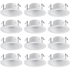 twelve white recessed lights are shown on a white background with clippings for each light