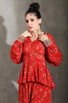 Red peplum top with all over floral prints and embellished cuffs. Paired with coordinating pant. - Aza Fashions Festive Fitted Sets With Blouson Sleeves, Festive Peplum Set With Floral Print, Elegant Red Floral Print Sets, Elegant Red Sets With Floral Print, V Neck Peplum Top, Red Peplum Tops, Printed Peplum Top, Diana Penty, Pant For Women