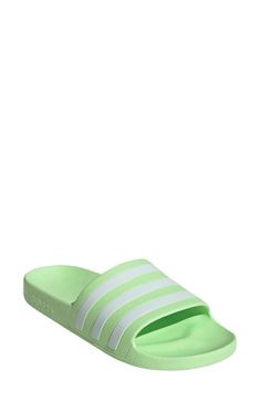 A comfortable pair of slide sandals feature a contoured footbed for support..Open toe.Slip-on style.EVA upper and sole.Imported.Item #6612524 Green Cushioned Synthetic Slippers, Green Non-slip Slippers For Spring, Comfortable Green Slide Slippers, Comfortable Green Synthetic Slippers, Spring Green Non-slip Slippers, Comfortable Green Flat Flip Flops, Green Comfortable Flat Flip Flops, Trendy Synthetic Slides With Arch Support, Comfortable Green Synthetic Flip Flops