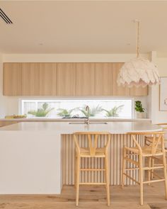 the kitchen is clean and ready to be used as a living room or dining area