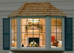 an open window shows the inside of a house