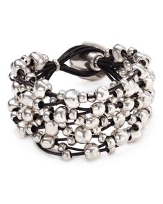 Unconventionally radiant, Uno de 50's masterful bracelet has a bubbly, weekend-right charm. Silver Jewelry With Round Beads For Fashion, Elegant Multi-strand Silver Beads Bracelet, Modern Polished Beads Bracelet, Modern Silver Multi-strand Jewelry, Modern Multi-strand Silver Jewelry, Silver Bracelets With Round Beads As Fashion Accessory, Elegant Silver Bracelets With Large Beads, Elegant Silver Bracelet With Large Beads, Elegant Multi-strand Polished Beaded Bracelets