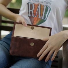 With so many ladies' wallets on the market, it's difficult to decide which one best fits your needs. We are here to help and believe we have some great options to consider. Our Handmade Brown Women’s Wallet is a comfortable way to carry your necessities. There are two bill compartments, 12 storage slots for cards and two open space compartments. The interior zipper pocket is perfect for those small items and loose change. Everything closes easily with a magnetic closure. Beyond its great appeara Wallets Coach, Leather Wallets For Women, Leather Change Purse, Coach Backpack, Leather Camera Strap, Lake Atitlan, Womens Wallet, Brown Leather Wallet, Women Wallet