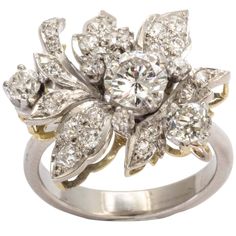 A stunning diamond and platinum flower ring with a center diamond of 1-carat with a total of 3-carat. Vintage Jewellery Rings, Vintage Cocktail Ring, Best Friend Jewelry, Sparkly Things, Crystal Hoop Earrings, Couture Vintage, Vintage Cocktail, Art Deco Earrings, Faux Pearl Necklace