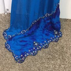 Indian Royal Blue Wedding Saree- Beautiful Royal Blue Color - Silk Material - Blouse Included - Contrast Color Beads And Stone Work On The Edges And All Over The Saree- Blouse Shoulder 14 Inches Armpit To Armpit 37 Waist 29 Inches Neck Deep To 5 Inches Saree Over All Length 6 Yards Belted To The Last End Is 29 Length From Waist To Toe 39.5 Inches Indian Wedding Saree, Saree Beautiful, Royal Blue Wedding, Neck Deep, Wedding Saree Indian, Color Beads, Wedding Saree, Royal Blue Color, Stone Work