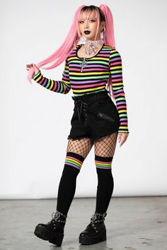 NIKIKO.- Ribbed, super stretch cotton fabric.- Statement stripe design.- Lettuce hem.- Cropped.- Scoop neck with zip.- Metal pentagram zip pendant.- Fitted.Model is 5ft 4 and wears a size XS.with KILLSTAR branding, 92% Cotton 8% Elastane. Goth With Color, Rainbow Goth Outfit, Cute Scene Outfits, Colorful Punk Fashion, Goth Pride Outfit, Rainbow Goth Aesthetic, Rainbow Outfit Women, Colorful Goth Outfits, Hyperpop Outfit