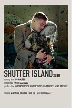 the poster for shutter island 2010 shows a man in a suit and tie holding a stuffed animal